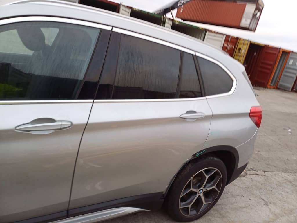 BMW X1 XDRIVE28I 2016 — Вивантаження photo 3
