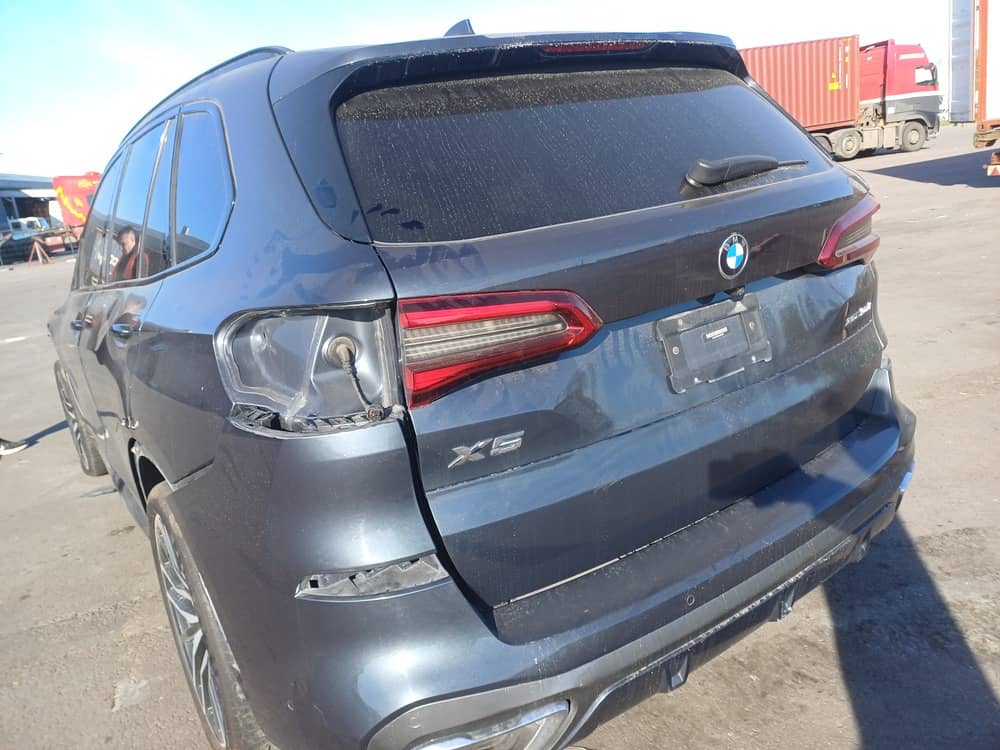 BMW X5 XDRIVE50I, 2019 — Вивантаження photo 9