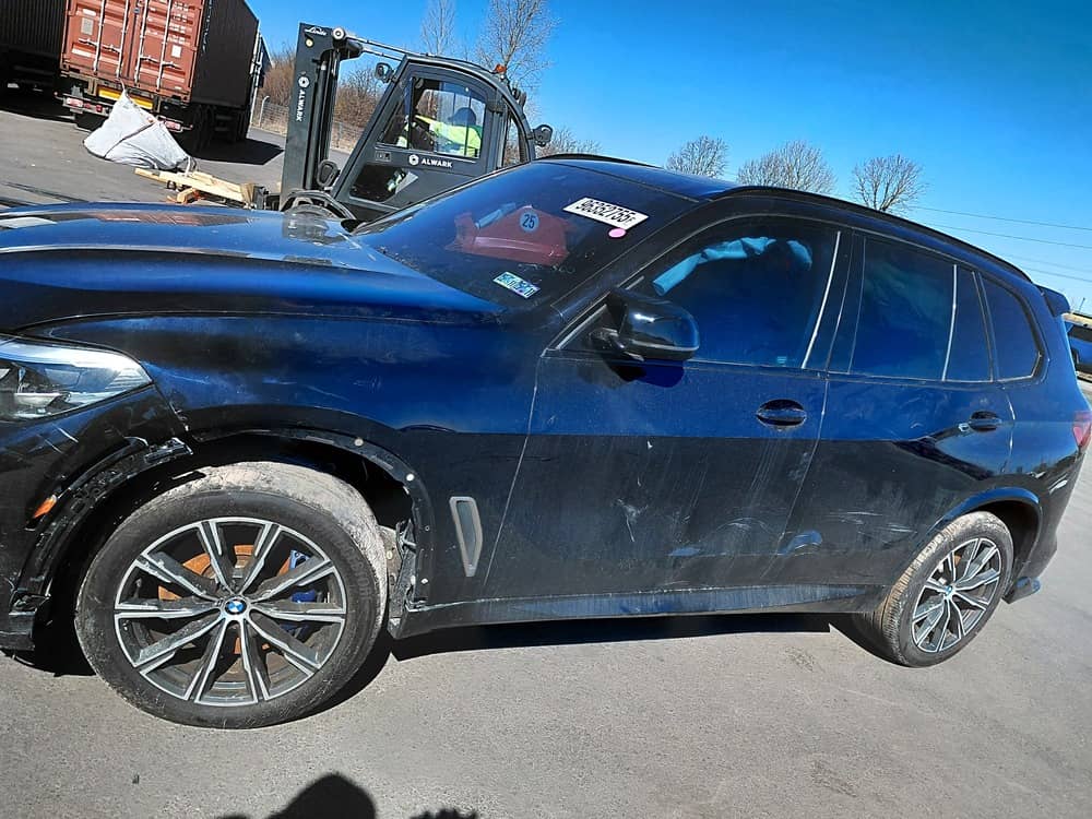 BMW X5 M50I, 2020 (2019) — Вивантаження photo 4